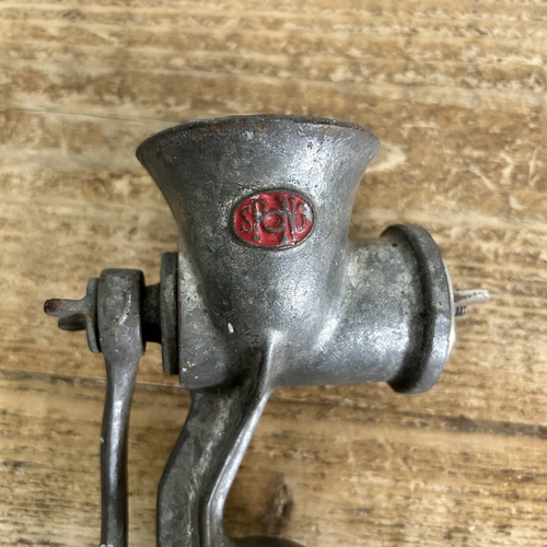 72 - A quantity of kitchenalia including a Spong mincer, ceramic jars (lids as found), copper saucepan, c... 