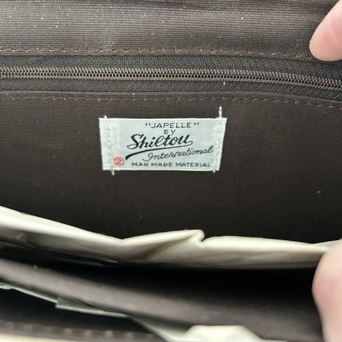 75 - Four vintage clutch bags including a Suzy Smith example