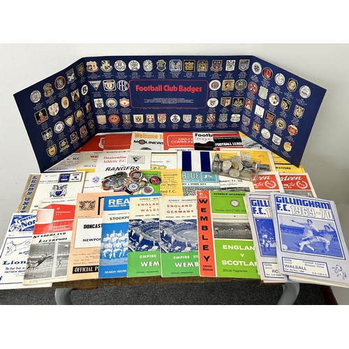 76 - A collection of 1960's football programmes together with an Esso folder for the collection of footba... 