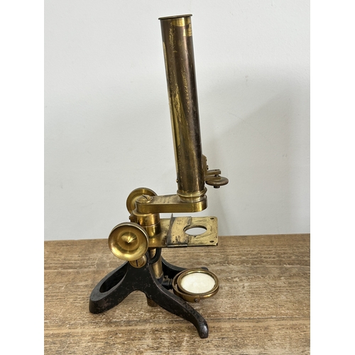 81 - A boxed Victorian Watson & Sons High Holborn London brass microscope, drawer in case containing clea... 