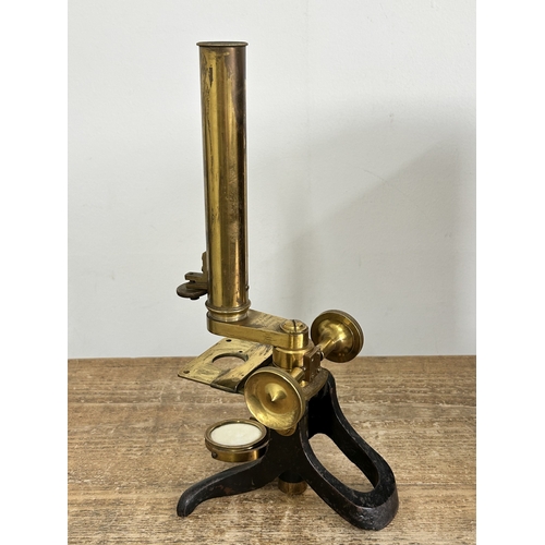 81 - A boxed Victorian Watson & Sons High Holborn London brass microscope, drawer in case containing clea... 