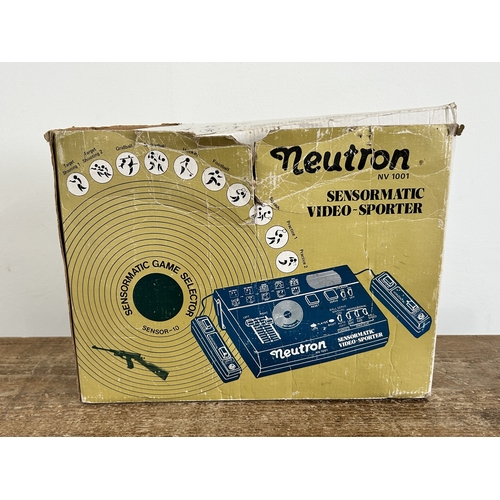 82 - A boxed vintage Neutron NV801 Video-Sporter game with controllers (box with wear and unit not tested... 