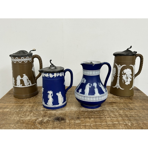 88 - 19th Century Wedgwood Blue Jasper ware lidded jugs together with two 19th Century Jasper style lidde... 