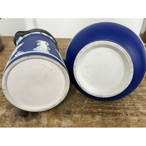 88 - 19th Century Wedgwood Blue Jasper ware lidded jugs together with two 19th Century Jasper style lidde... 