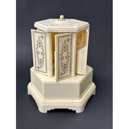 91 - A vintage Selcol musical cigarette dispenser, also known as a lipstick carousel, approx. 7 3/4