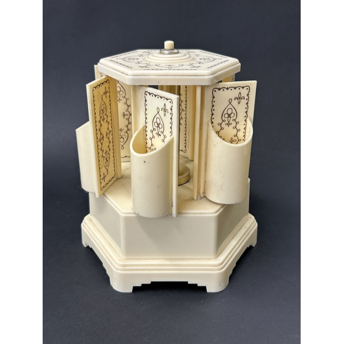 91 - A vintage Selcol musical cigarette dispenser, also known as a lipstick carousel, approx. 7 3/4