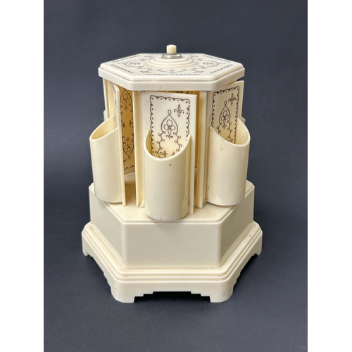 91 - A vintage Selcol musical cigarette dispenser, also known as a lipstick carousel, approx. 7 3/4