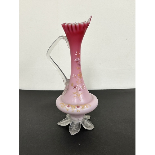 95 - Mixed vintage coloured glassware including an opaline jug, cranberry, Carnival, a Wedgwood otter etc... 