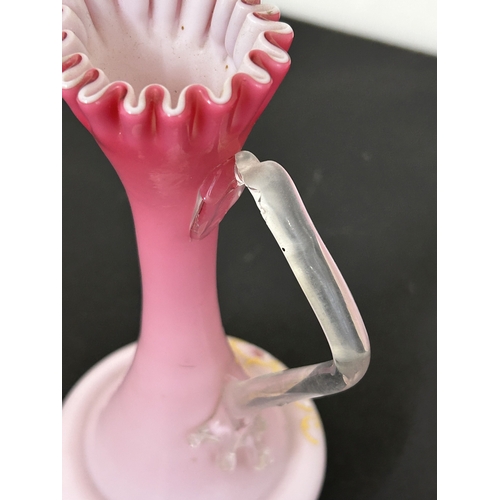 95 - Mixed vintage coloured glassware including an opaline jug, cranberry, Carnival, a Wedgwood otter etc... 