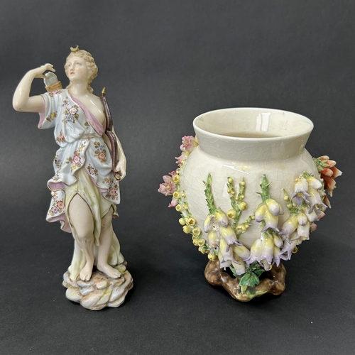 99 - An unusual vintage flower encrusted small vase, approx. 5