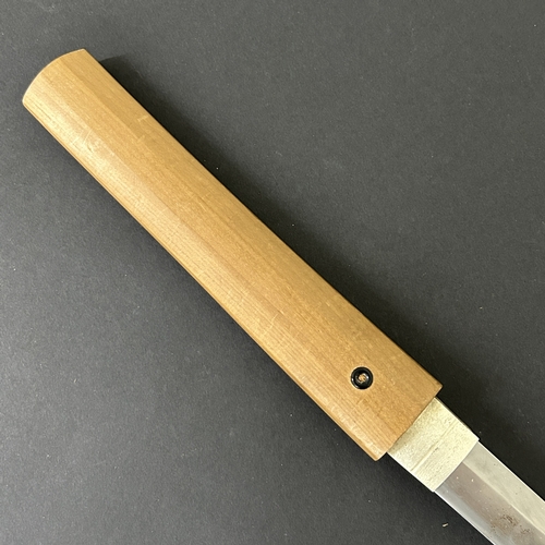 200 - An antique Japanese Katana in a natural wood scabbard, no marks to tang, polished blade with hamon m... 