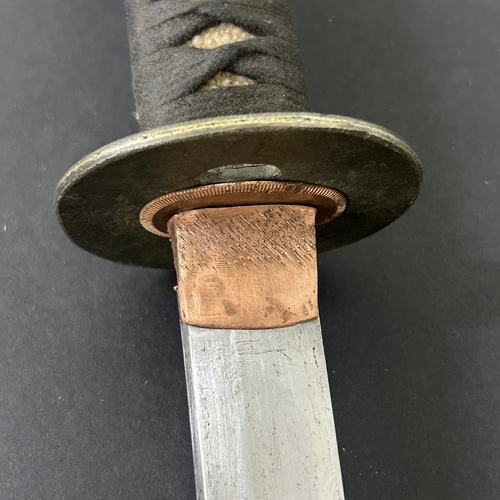 201 - An antique Wakizashi Japanese sword in a lacquered wooden scabbard with re-attached loop, polished b... 