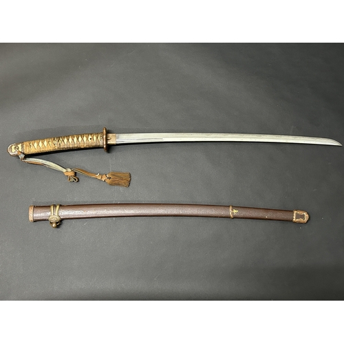 202 - A Shin-Gunto mounted Japanese Officers Katana in a brown lacquered Saya with military mounts, visibl... 