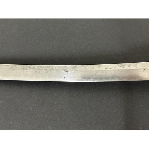 203 - An antique Wakizashi Japanese sword in scabbard, polished with traces of hamon marks, decorated Tsub... 