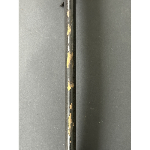 203 - An antique Wakizashi Japanese sword in scabbard, polished with traces of hamon marks, decorated Tsub... 