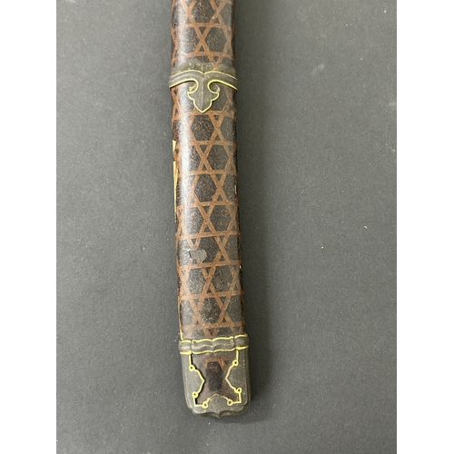 204 - An antique Wakizashi Japanese sword with a Tsuka and Tsuba and yellow metal Menukis, blade approx. 1... 