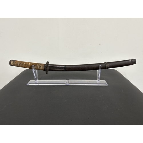 205 - An antique Wakizashi Japanese sword in scabbard, polished blade, hamon marks present, very old Tsuba... 