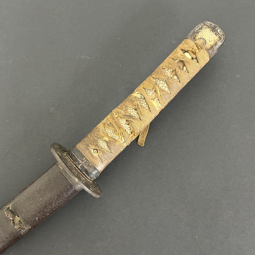 205 - An antique Wakizashi Japanese sword in scabbard, polished blade, hamon marks present, very old Tsuba... 