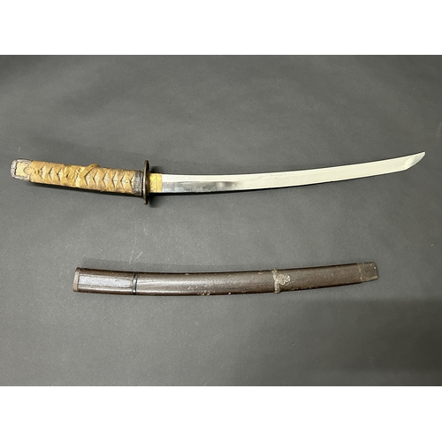 205 - An antique Wakizashi Japanese sword in scabbard, polished blade, hamon marks present, very old Tsuba... 