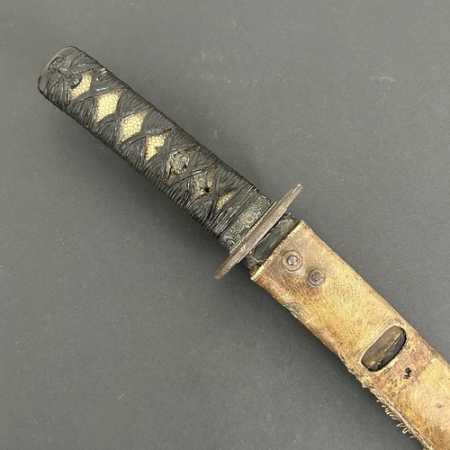 208 - An antique Japanese Wakizashi in non-matching leather covered wooden scabbard, polished blade, a Tsu... 