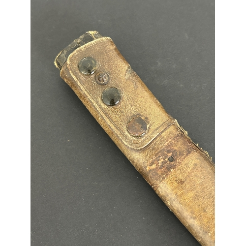 208 - An antique Japanese Wakizashi in non-matching leather covered wooden scabbard, polished blade, a Tsu... 