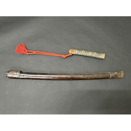 211 - A Japanese Tsuka with sword knot and pommel with bindings (but no ray skin) together with a wooden s... 