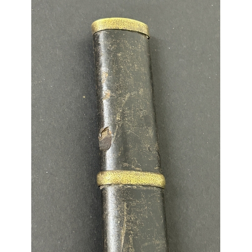 214 - An antique Wakizashi Japanese sword in a wooden scabbard, polished blade with an unusual mark, light... 
