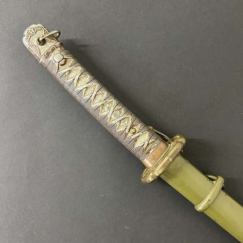 217 - A Shin-Gunto Japanese sword, standard WW2 issue in a green scabbard, military mounts, matching numbe... 