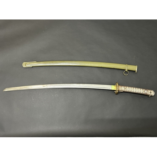 217 - A Shin-Gunto Japanese sword, standard WW2 issue in a green scabbard, military mounts, matching numbe... 