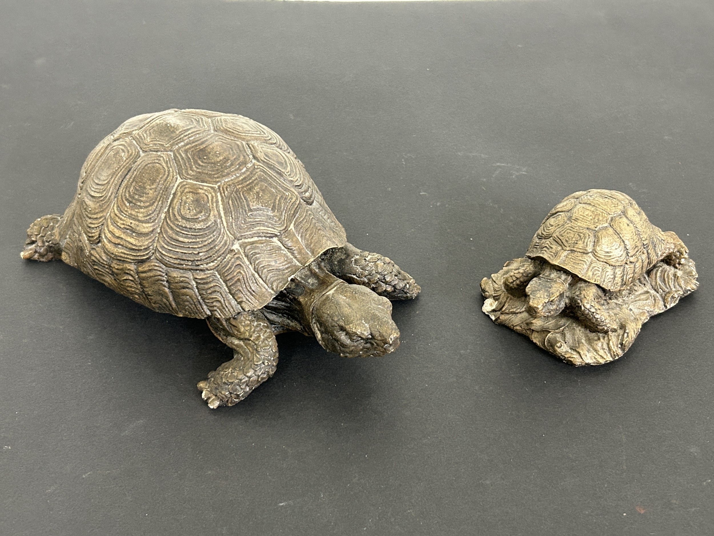 Two concrete tortoises, the largest approx. 7
