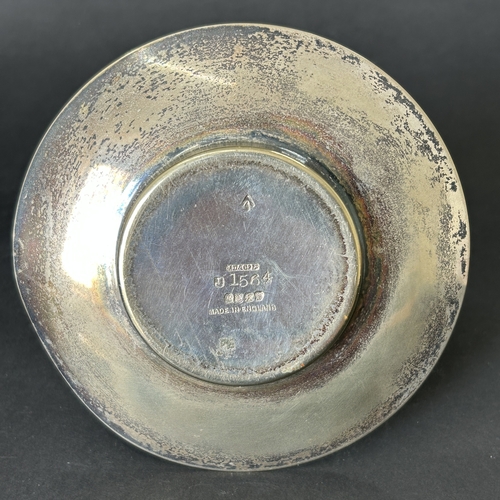 125 - A silver plated base preserve stand with a hallmarked silver lid and spoon, with 'broad arrow' mark ... 