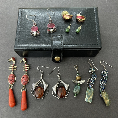 126 - A small collection of mainly costume earrings including one pair of 925 sterling silver amber style
