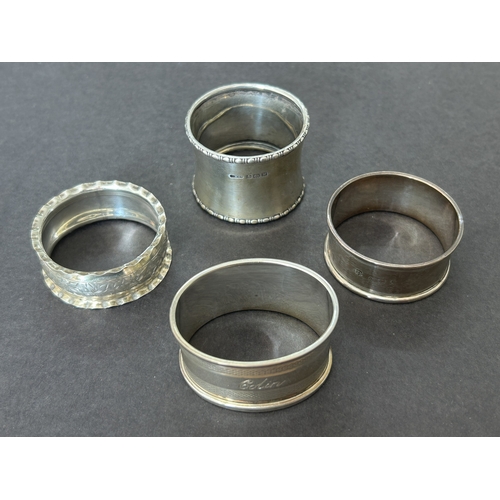 128 - Four vintage hallmarked silver napkin rings, weight approx. 48g