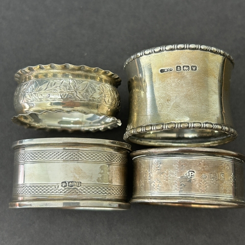 128 - Four vintage hallmarked silver napkin rings, weight approx. 48g