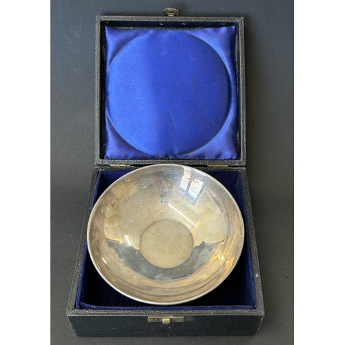 136 - A boxed mid century hallmarked silver footed bowl, bears Coronation 1953 hallmarks and engraved dedi... 