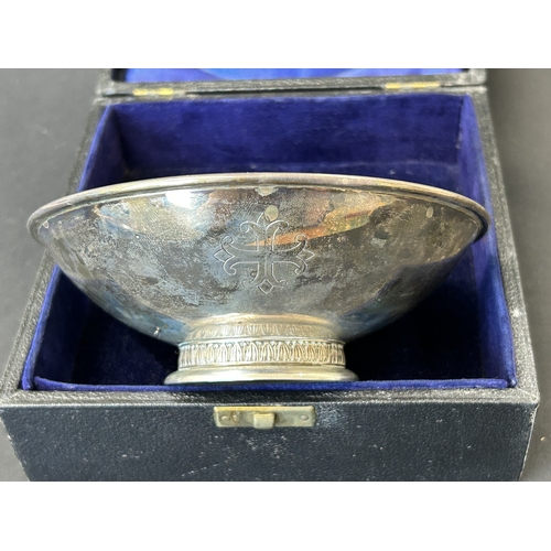 136 - A boxed mid century hallmarked silver footed bowl, bears Coronation 1953 hallmarks and engraved dedi... 