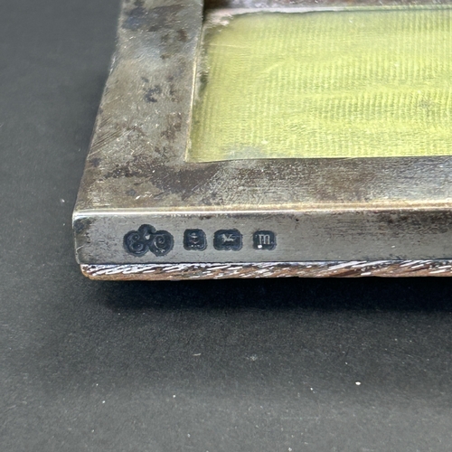 137 - A hallmarked silver photo frame, 5 1/2