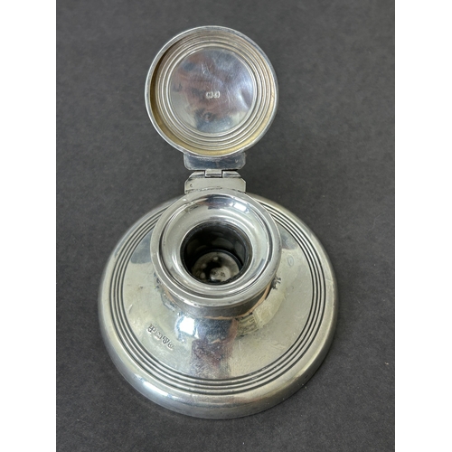 141 - A Chester hallmarked silver capstan inkwell with wood base, combined weight approx. 93g