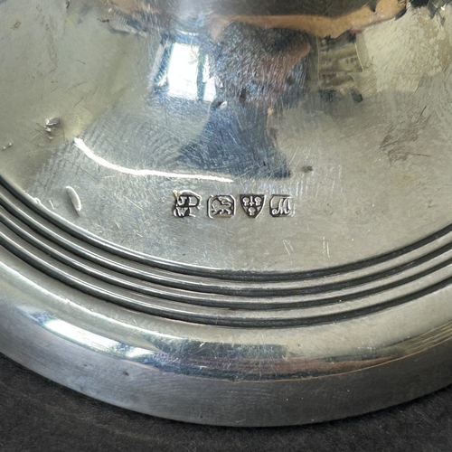 141 - A Chester hallmarked silver capstan inkwell with wood base, combined weight approx. 93g