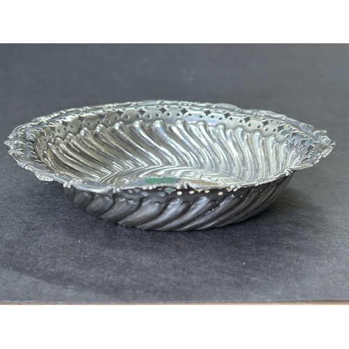 143 - A hallmarked silver pierced bon-bon dish, just over 4 1/4
