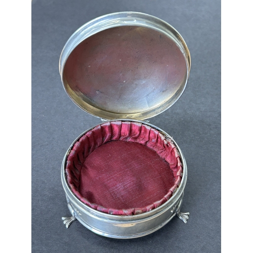 144 - A hallmarked silver and velvet lined trinket pot on three claw feet, weight approx. 35g