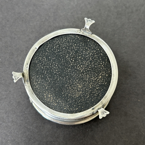 144 - A hallmarked silver and velvet lined trinket pot on three claw feet, weight approx. 35g