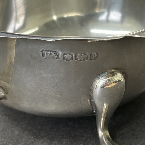 146 - A mid century hallmarked silver gravy boat, approx. 5 3/4