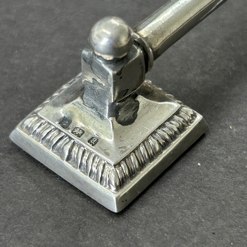 147 - A pair of hallmarked silver knife rests with filled bases, approx. 3 1/2