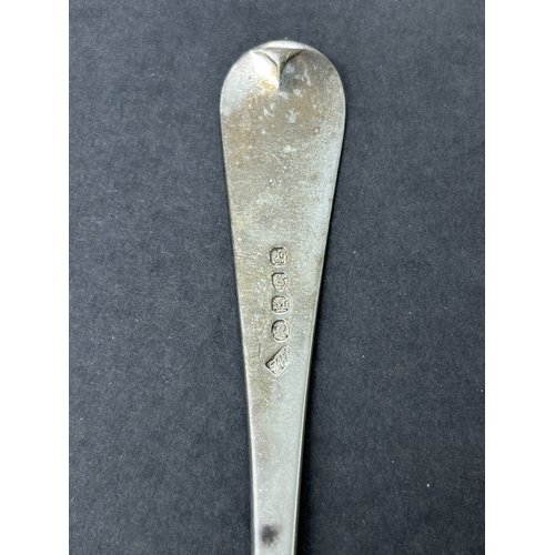 151 - A Georgian hallmarked silver table spoon, weight approx. 65g (bowl worn and dents)