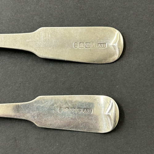 153 - A pair of Georgian Edinburgh silver table spoons, weight approx. 125g