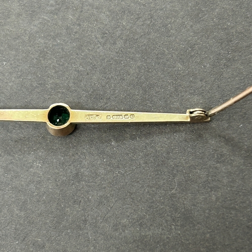 159 - A 9ct gold and green stone set brooch, weight approx. 2.3g