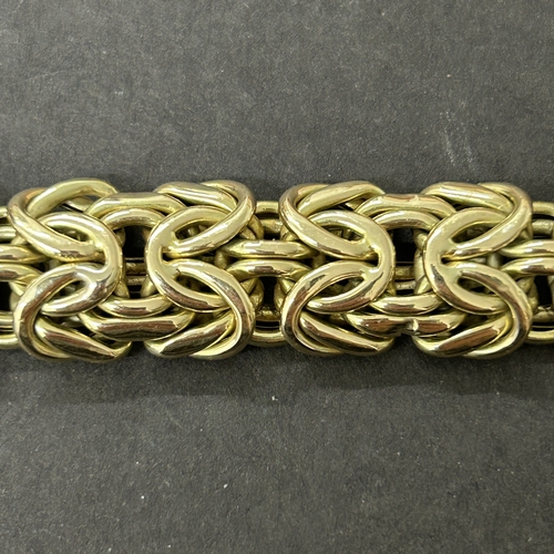 163 - A stunning 585 (14ct gold) byzantine link bracelet with applied plaque for 'Cetas 585', fine gold je... 