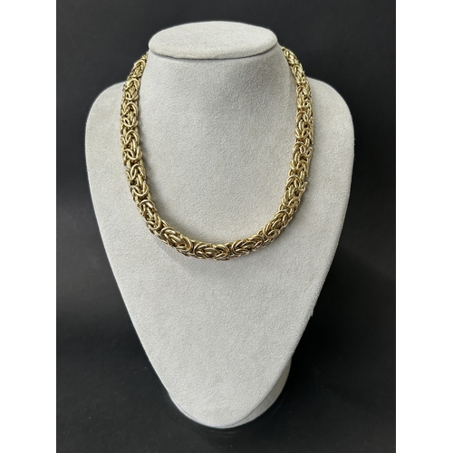 164 - A stunning 585 (14ct gold) byzantine link necklace with applied plaque for 'Cetas 585', fine gold je... 