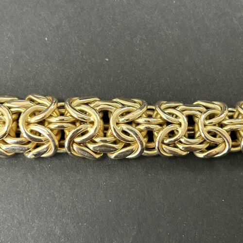 164 - A stunning 585 (14ct gold) byzantine link necklace with applied plaque for 'Cetas 585', fine gold je... 